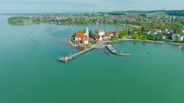 The moated castle peninsula on Lake Constance with the baroque church of St. George, jetty and marina, Lindau district, Swabia, Bavaria, Germany, Europe