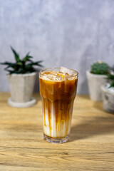 honey milk coffee on wooden table