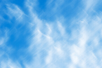 Beautiful blue sky with cirrus clouds. Fluffy clouds in the sky.