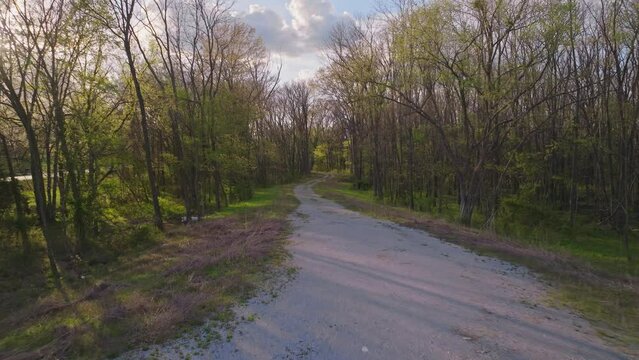 Forest Trail And Trees Near Lake Sequoyah In Arkansas, United States - drone forward
