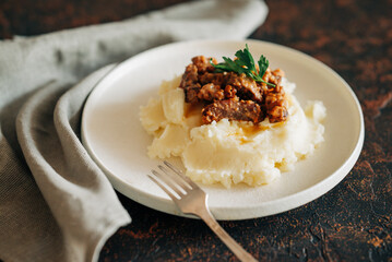 Tasty mashed potato with beef stroganoff hot dishes in lifestyle rustic style beautiful food image