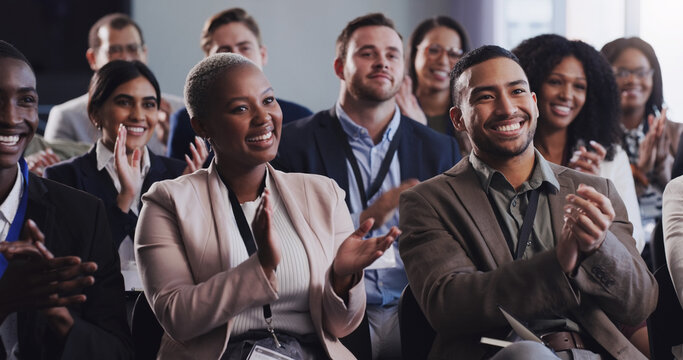 Business people, conference and audience applause at seminar, workshop or training. Diversity men and women crowd clapping at presentation or convention for corporate success, bonus or growth