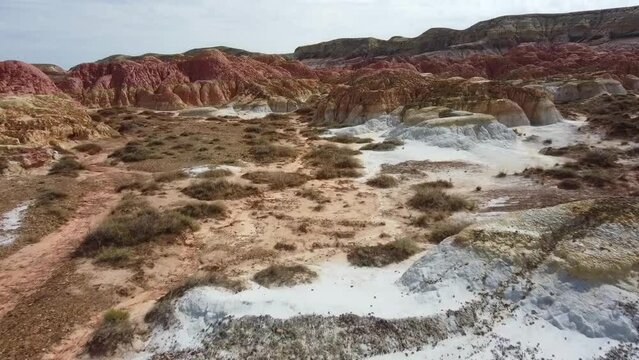 Landscape of multi-colored clay dunes. Mars on earth. Video frome drone. 