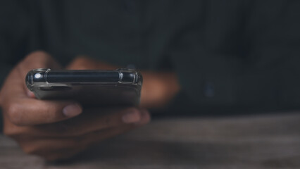 Man hand using mobile smartphone. copy space.