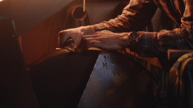 Griding and forging knife by blacksmith