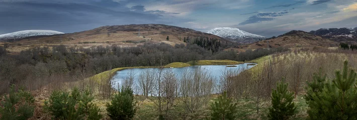 Foto auf Leinwand Loch Ranghoch Pitlochry Scotland. Lake and snowcapped mountains. Panorama.  © A