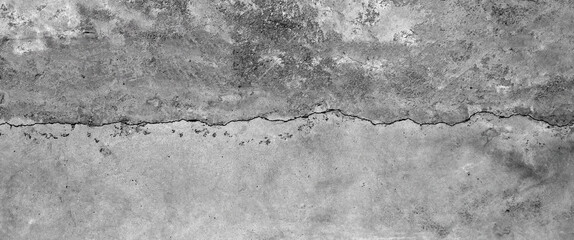 Cracked cement wall texture for background.