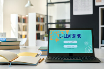 Close-up of laptop on table with application on the screen for online education