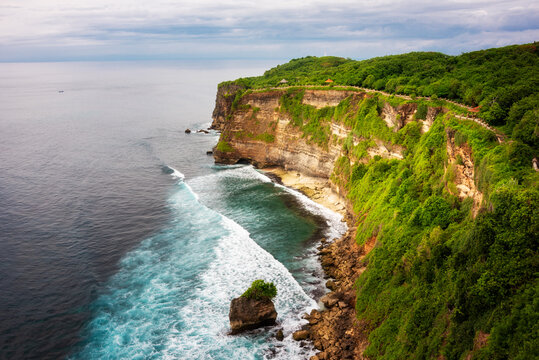 Uluwatu cliff on ocean coast on Bali island, Indonesia