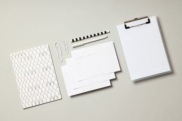 Mockup flat lay with different office accessories on light gray background