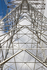 Power line tower. Energy industry. Industrial electricity distribution. Renewable production