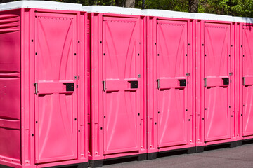 Portable wc. Public mobile toilet set in the street. Transportable