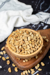 Dried mulberry. Sun-dried dried mulberry in wooden bowl. superfood Vegetarian food concept. healthy snacks. Close up
