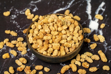 Dried mulberry. Sun-dried dried mulberry in bowl. superfood Vegetarian food concept. healthy snacks. Close up