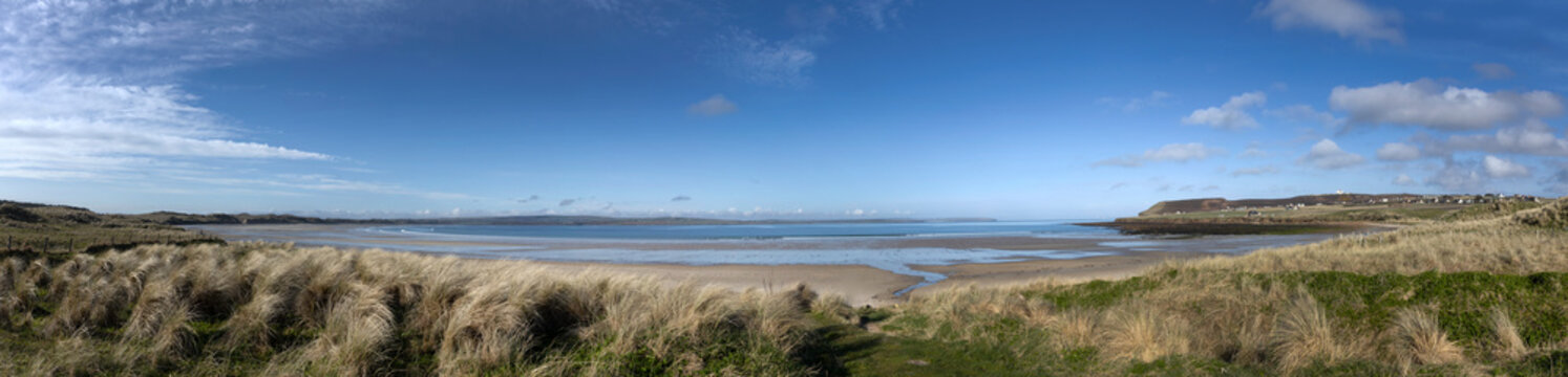 Dunes and grass. Beach, coast Dunnet Head Northern Scotland. Orkney islands. Panorama. 
