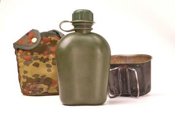 flask plastic army green not new from the front, separate cover from it and a cauldron of the...