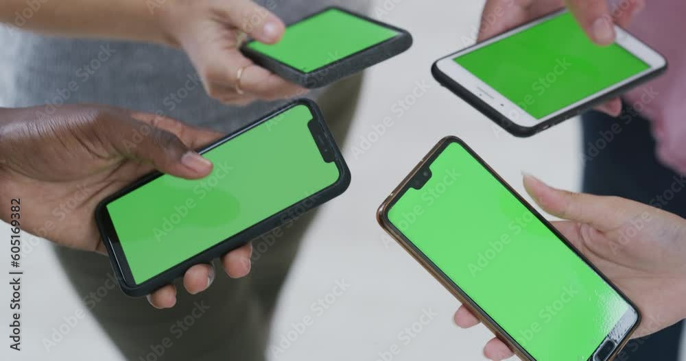 Aufkleber Phone, communication and green screen with people standing in a huddle to connect to a mobile network. Contact, teamwork and information with hands closeup in a circle for data while cloud computing