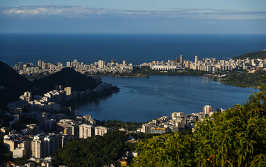 Obraz premium Rio de Janeiro from above during a beautiful summer morning. Aerial photo with the skyline of Rio city, view to Sugar Loaf landmark mountain. Travel to Brazil.
