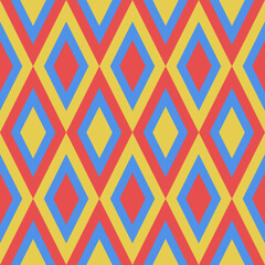 Seamless pattern with rhombuses in red, yellow and blue colors.