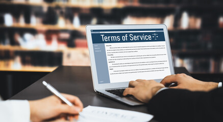 Online term of service conditions showing astute rules and regulations in using the website on a laptop computer screen for users to make an agreement