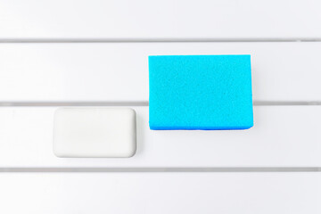 Universal kit for washing anything. Synthetic sponge and white soap