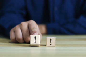 wooden blocks with exclamation marks arranged or arranged	