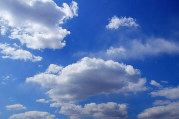 Naklejka na ściany i meble Blue sky background. Blue sky with white clouds