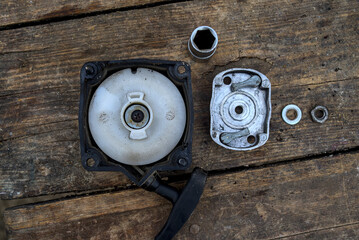 Disassembled starter from lawn mowers