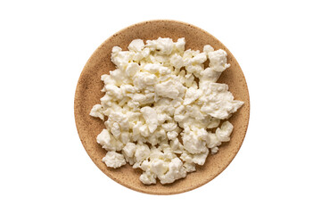 Fresh cheese in a ceramic plate on a white background, macro, top view.