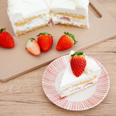Slice of fresh strawberry shortcake with whipped cream, Japanese style