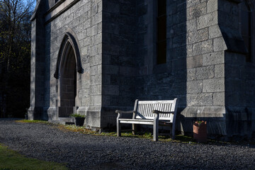Fototapeta na wymiar Victorian church at Slatach. Scotland. Highlands. Coast. Bench.