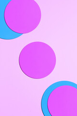 Paper pink background with shaped blue elements.