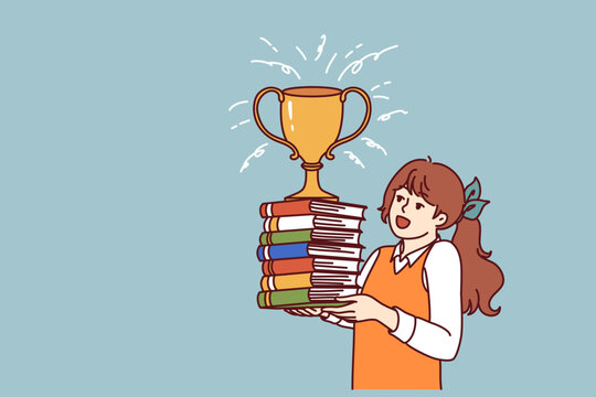 Schoolgirl with books and cup for winning olympiad rejoices at good marks for test. Child prodigy girl with golden cup of winner of olympiad enjoys prize of best elementary school student