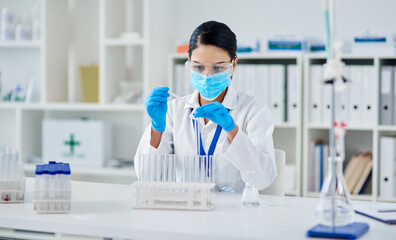 Covid, science and research with a woman in laboratory for innovation or modern medical...