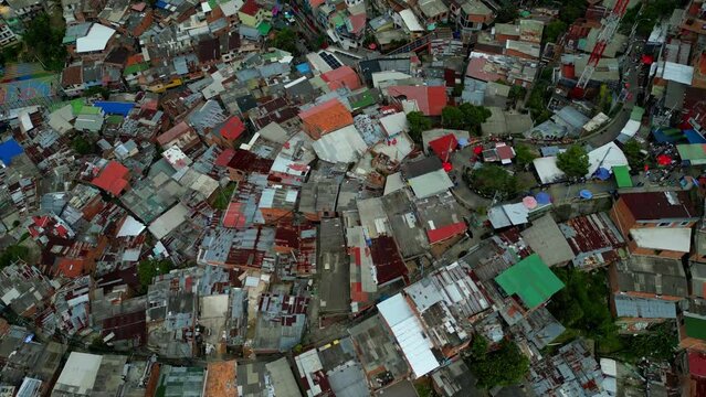 Comuna 13 Medellin Colombia escaleras electricas, graffiti and pablo escobar tour,  tourist attraction. 4k drone shot, view from above, famous