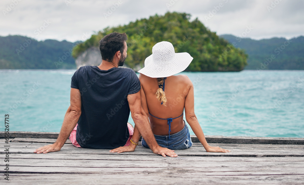 Sticker Back, couple and vacation together on ocean deck, dock or sitting on boardwalk to relax or enjoy the sea or water landscape. People, man and woman on holiday, summer travel or date in tropical nature