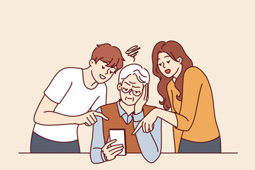 Elderly man learns to use phone and listens to advice of adult children teaching how to send SMS message. Old human is upset because of inability to use modern smartphone and online app