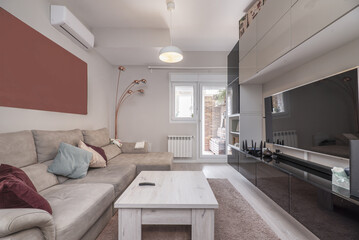 Living room of a furnished house with access to a terrace