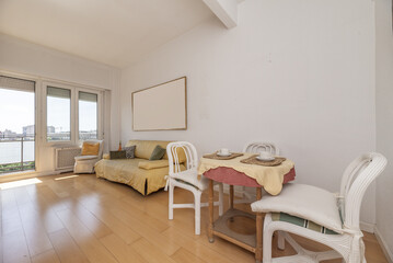 Fototapeta premium Living room of a house with access to a terrace