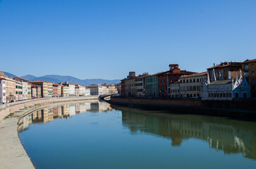 Obraz premium View at Embankment Arno River in Pisa stock photo