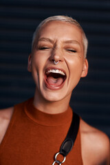 Young woman, happy scream and portrait with hipster and gen z fashion with a smile and piercing....
