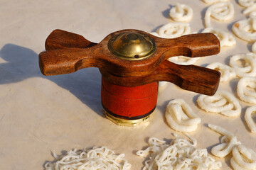 Making of Wheat Kurdai or kurawadi (String Papad), Kurdai are produced at home in India using only...