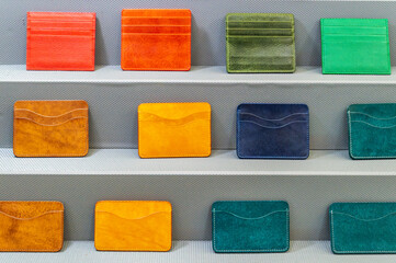 Multi-colored cardholders on a gray background