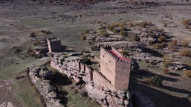 Aerial view over Zafra Castle in Campillo de Duenas
in Spain with the sea in the background