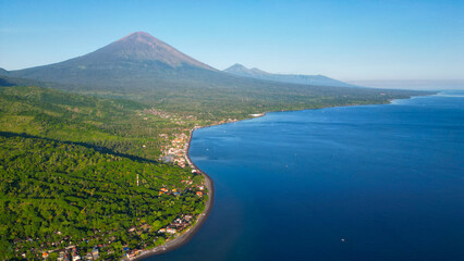 Aerial view of Amed. Amed is a 14-km strip of fishing villages in Karangasem Regency on the east coast of Bali, Indonesia.	 - obrazy, fototapety, plakaty