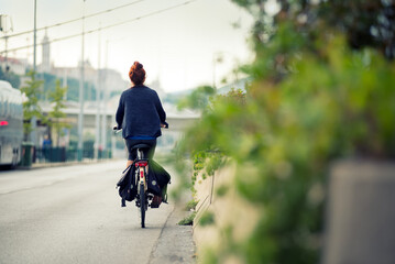 Woman travelling on a bicycle