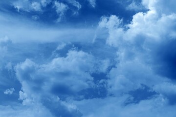 Naklejka na ściany i meble Beautiful cloudscape on a blue sky background