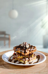 Irresistible chocolate waffle sandwich with a generous scoop of ice cream on top