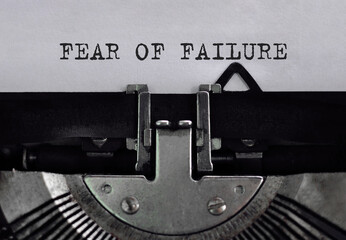 Text fear of failure typed on retro typewriter
