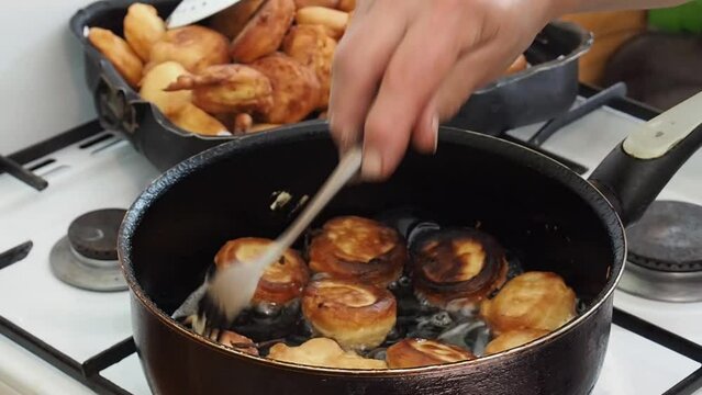 High-angle view of the homemade mini doughnuts frying process